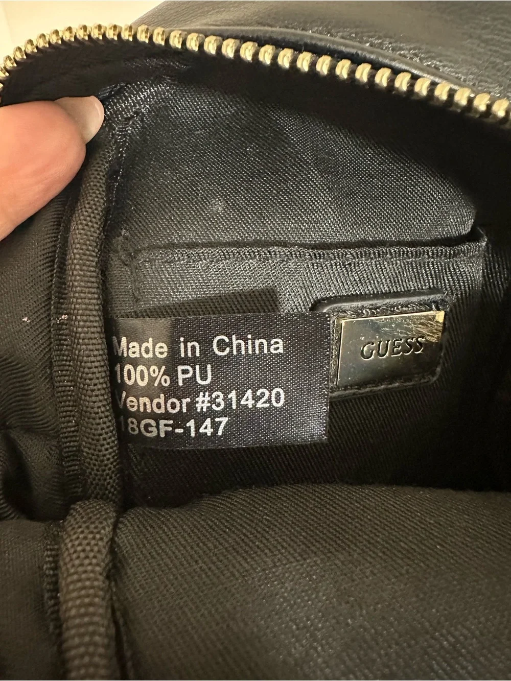 GUESS Black Quilted Mini Backpack Crossbody Bag